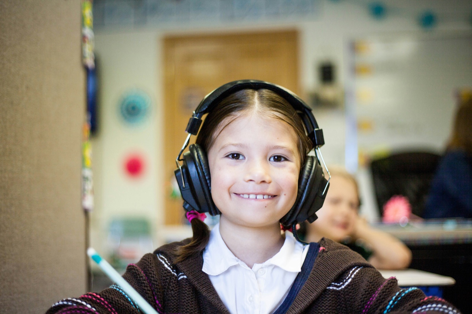 Parent helping child prepare for SATs at home